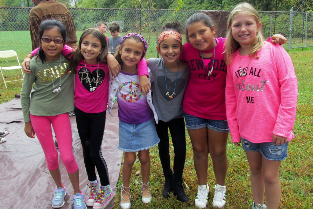 female students with their necklaces 